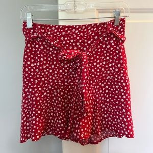 Zara red skort with white flowers. Size S